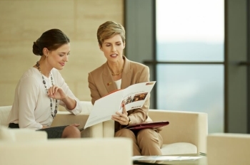 female financial advisor consulting with client